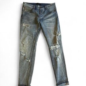 AMIRI Distressed Gray Skinny Jeans